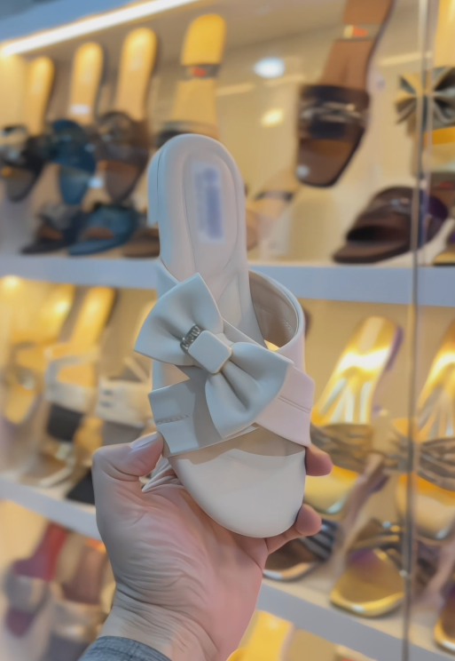 Ladies' Bow Accent Cross Strap Flat Slide Sandals