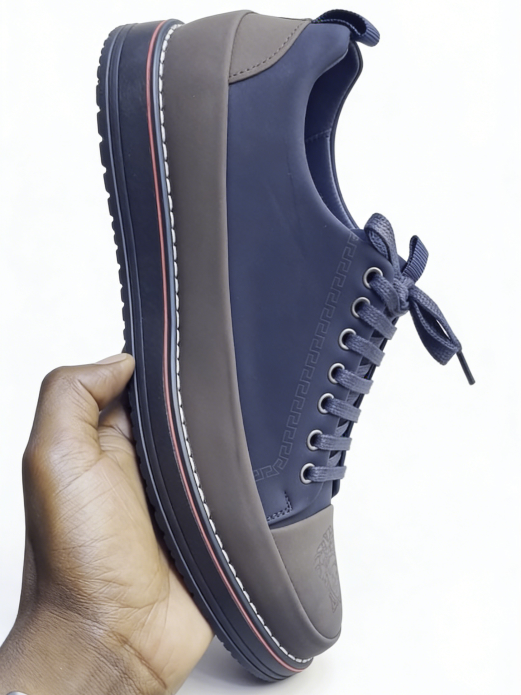 Medusa Embossed Leather Platform Sneakers