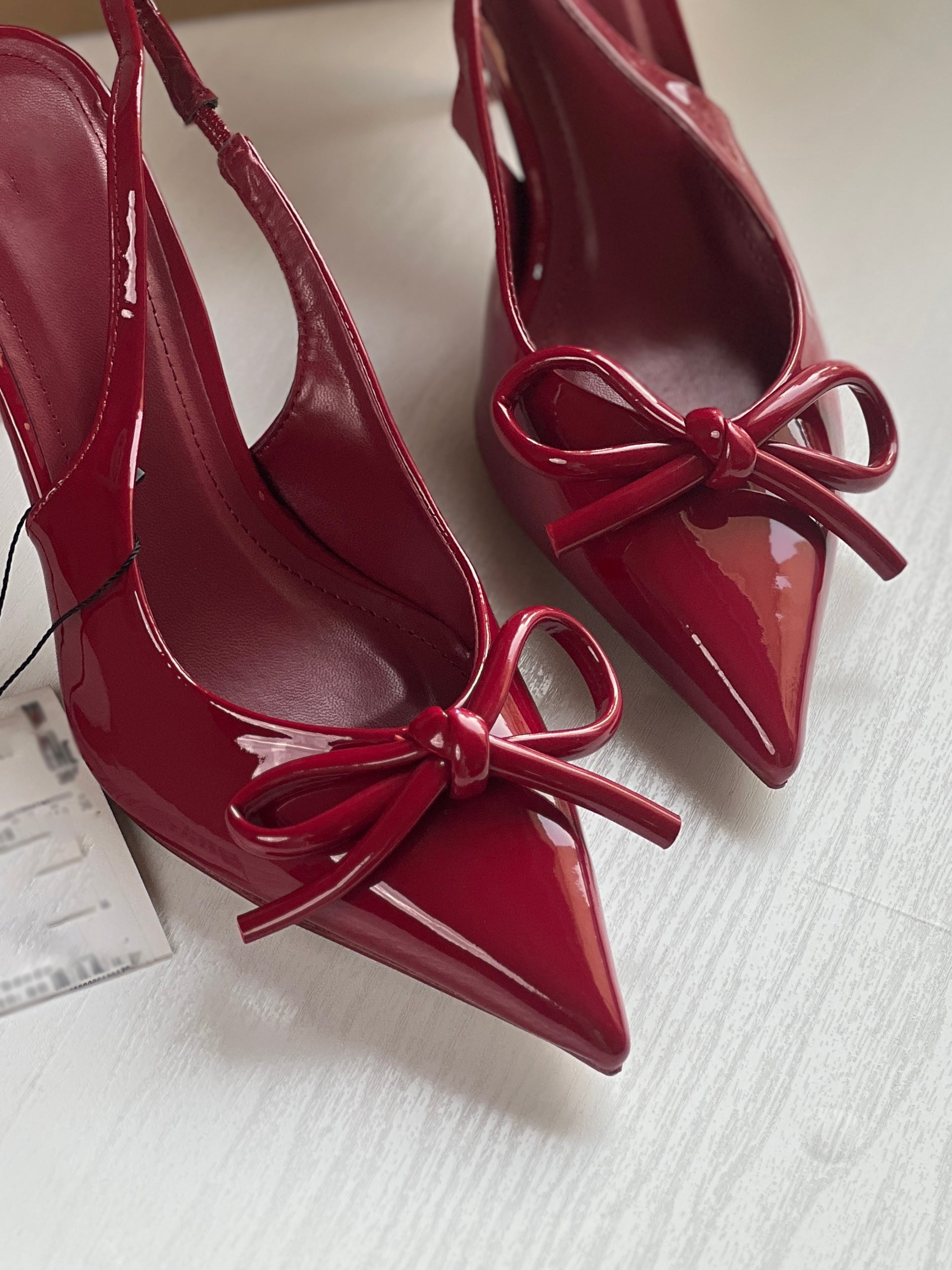 Ladies' Glossy Red Slingback Pumps with Bow Detail