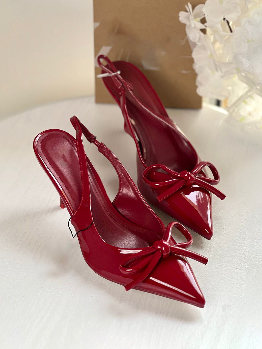 Ladies' Glossy Red Slingback Pumps with Bow Detail